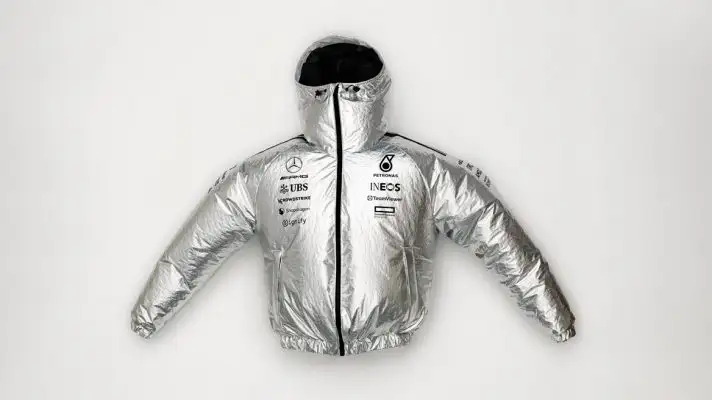 An image of Adidas' new Mercedes jacket that looks like a space suit