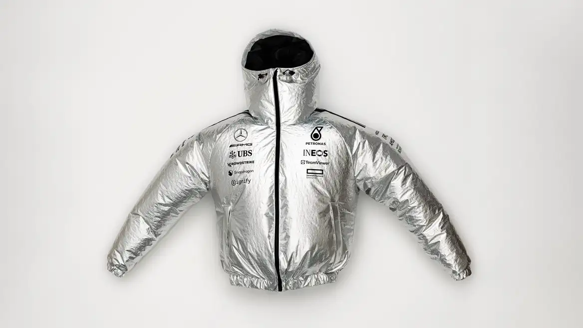 An image of Adidas' new Mercedes jacket that looks like a space suit