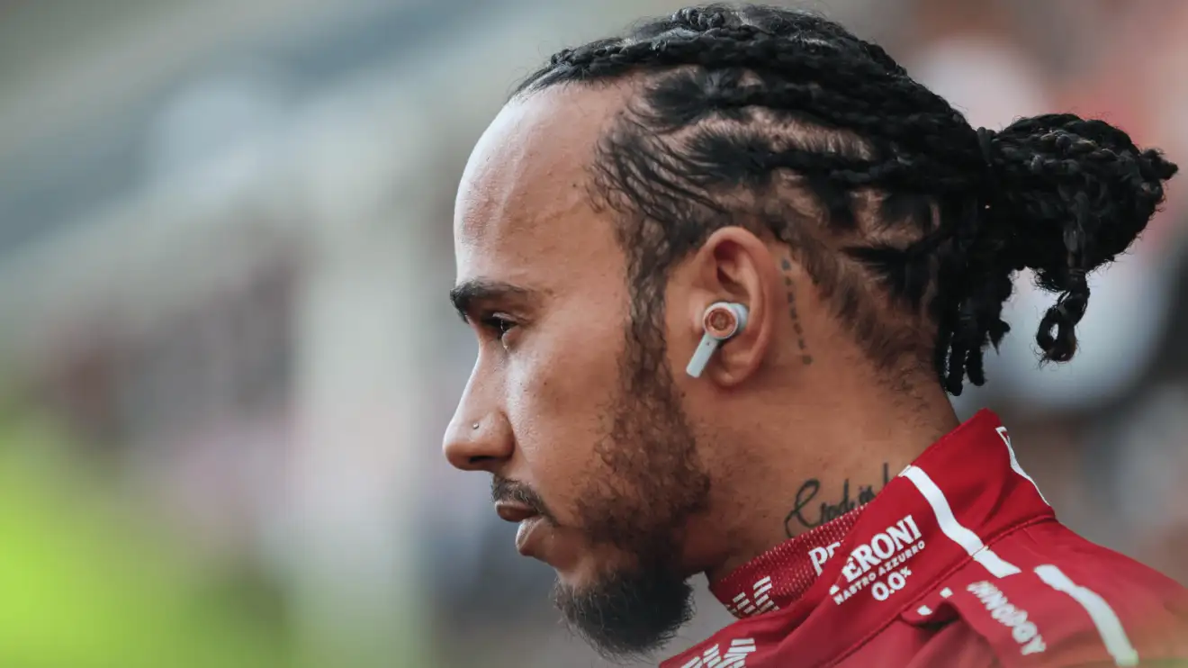 A side-profile shot of Lewis Hamilton on the starting grid in China