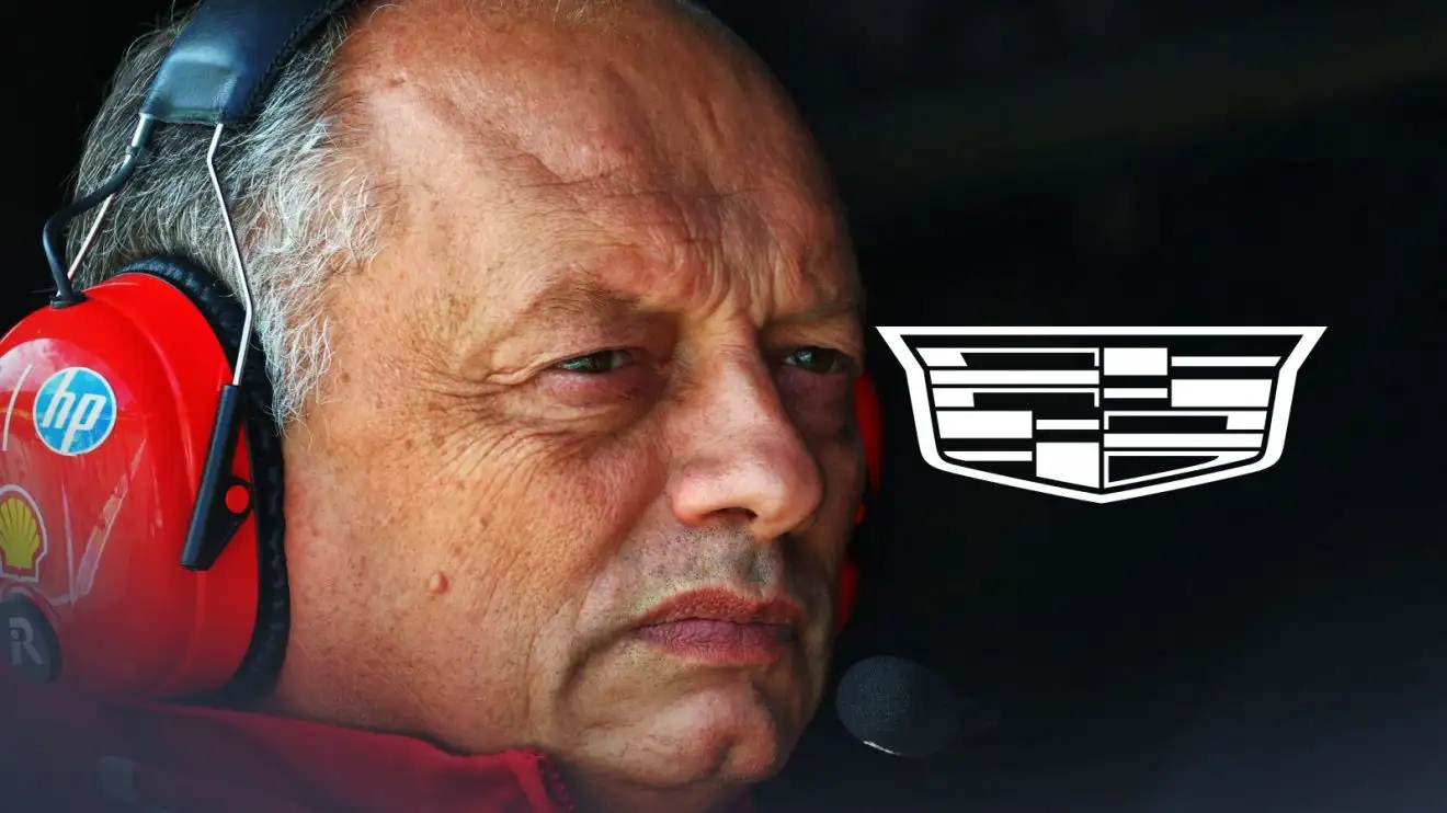 Ferrari team principal Fred Vasseur pictured at the 2025 Azerbaijan Grand Prix, as a Cadillac badge appears on his right