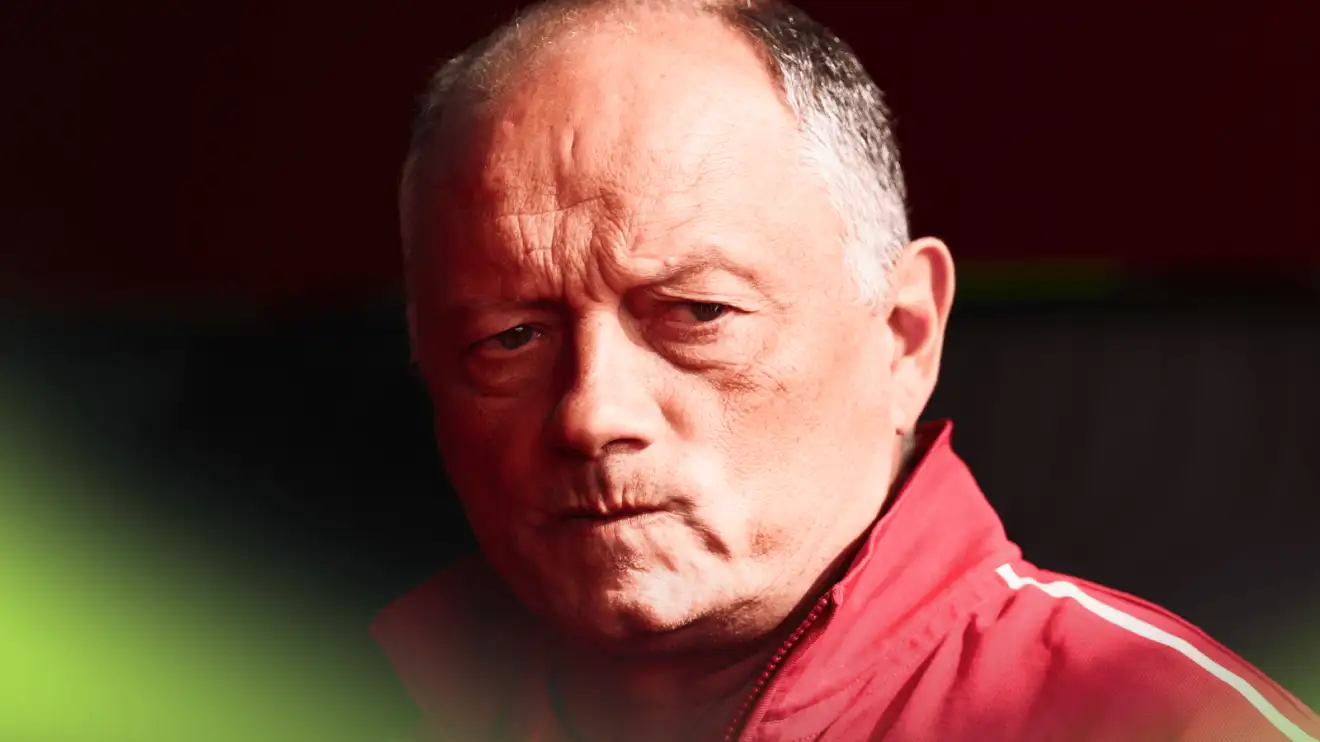 A close-up shot of an exasperated Fred Vasseur in the paddock