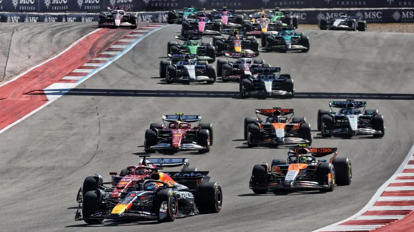 Max Verstappen leads the pack at the start of the United States Grand Prix.