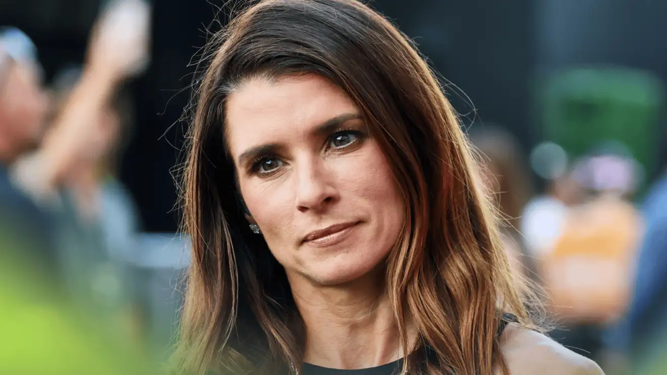 Danica Patrick looks on in the paddock in Austin