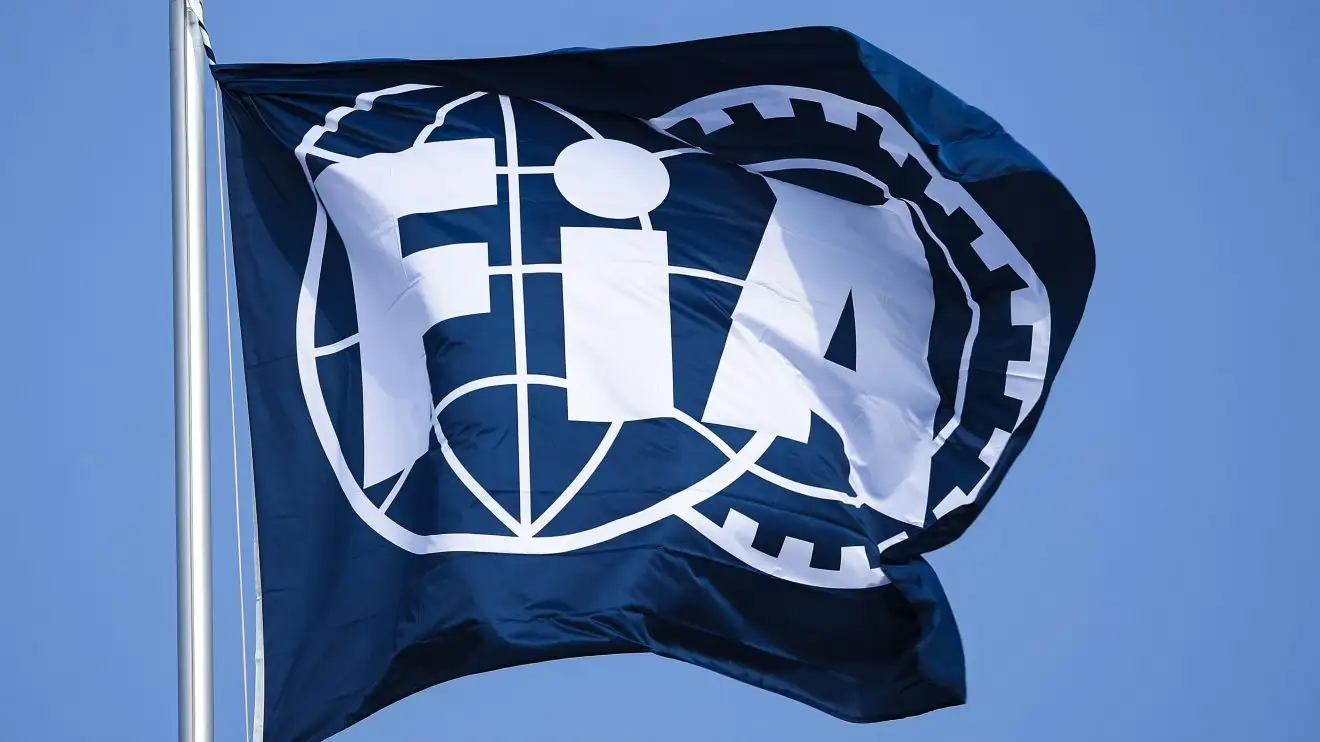 The FIA logo on a flag