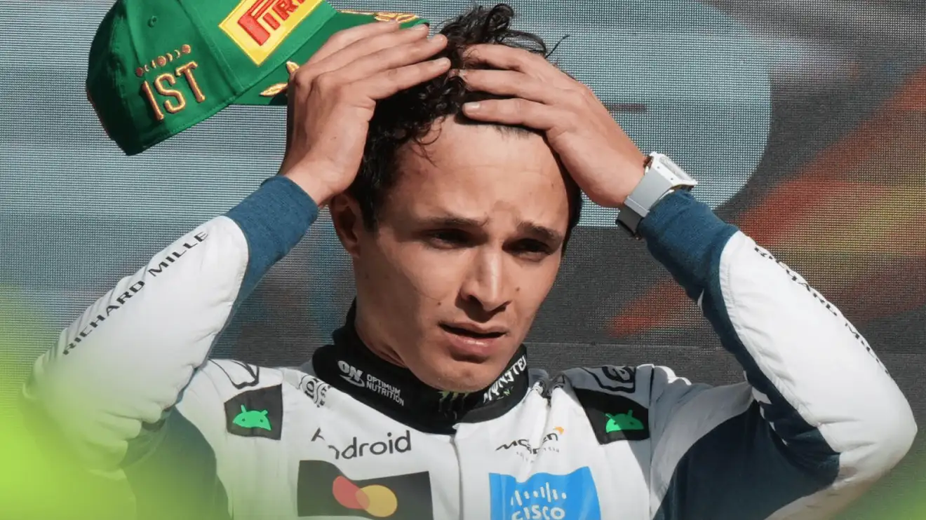 Lando Norris wipes his brow during the podium ceremony in Mexico