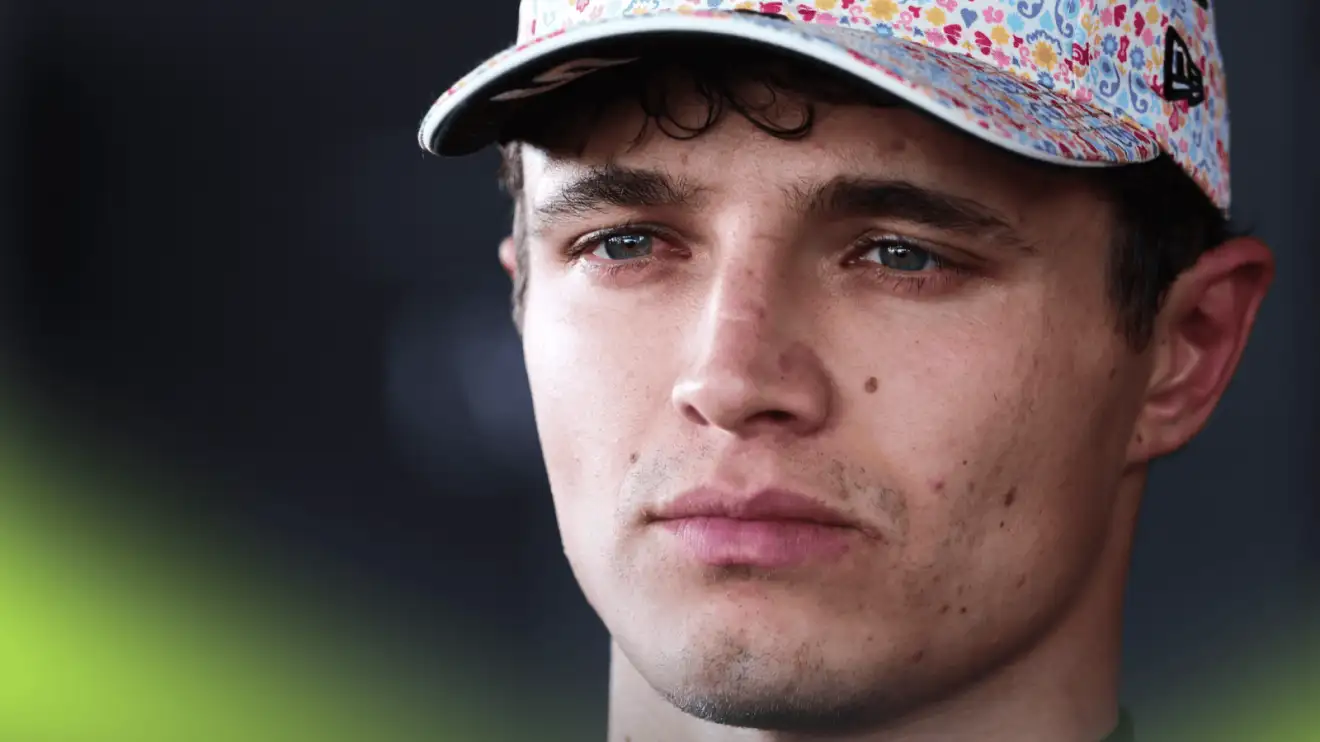 A close-up shot of Lando Norris wearing a Mexico GP-themed cap
