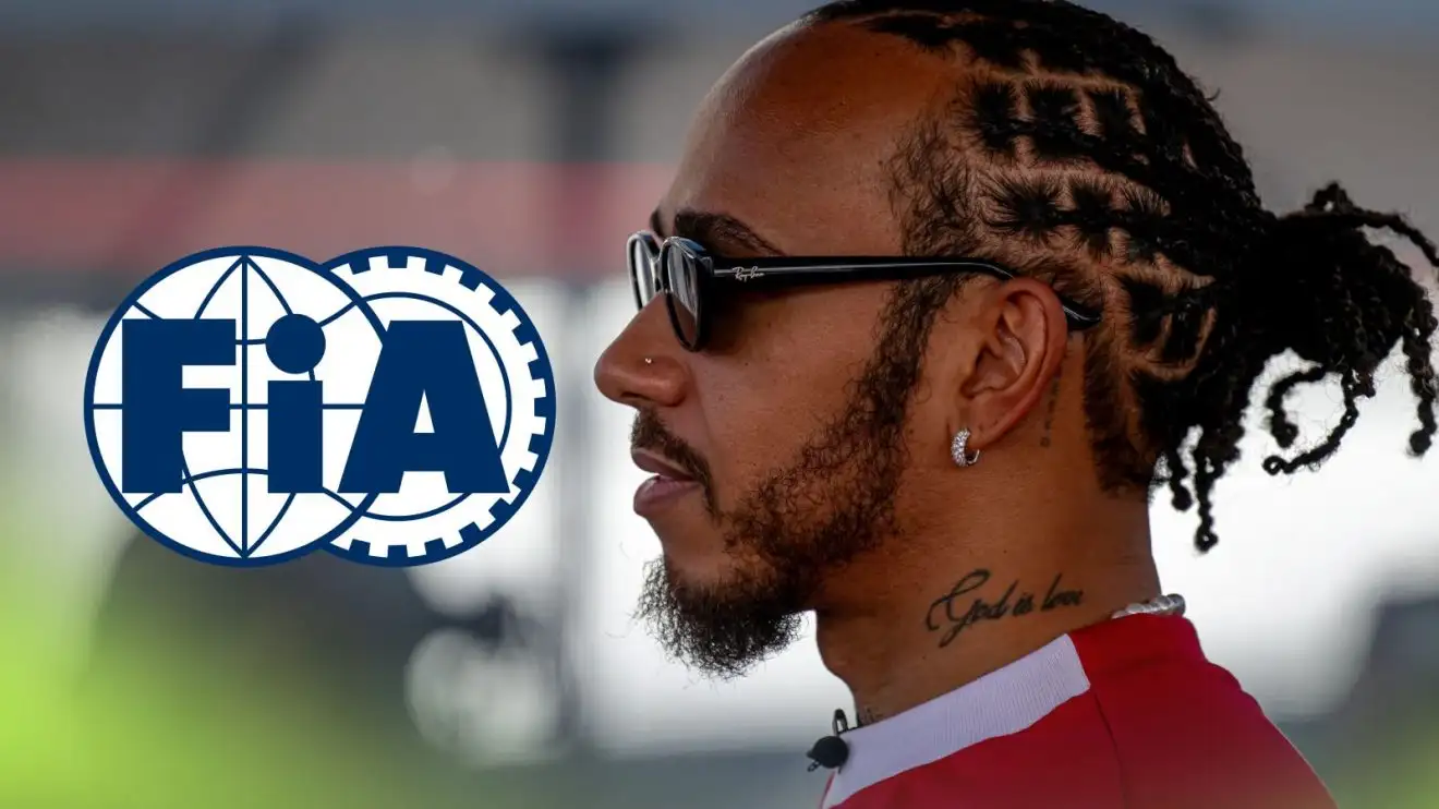 Lewis Hamilton speaks to the media at the 2025 Mexican Grand Prix, facing towards an FIA logo