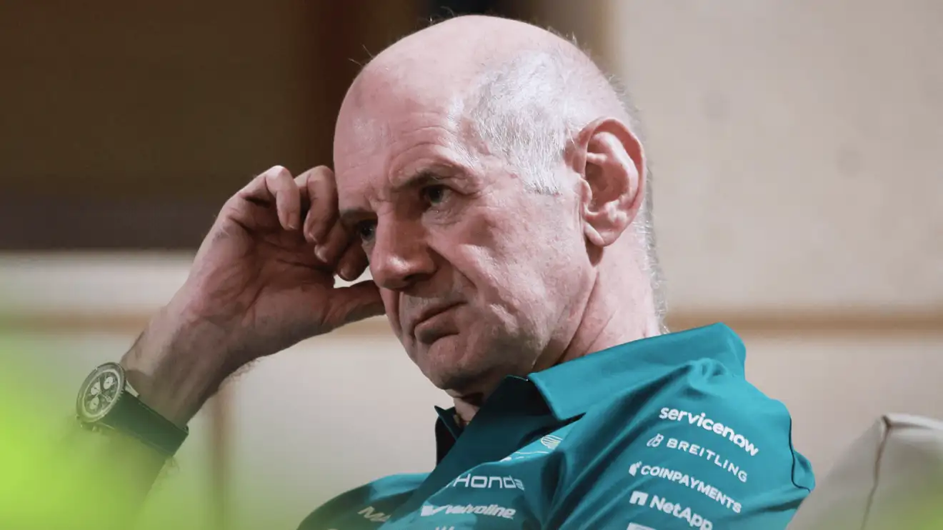 Adrian Newey rests his head on his hand during a paddock meeting in Bahrain