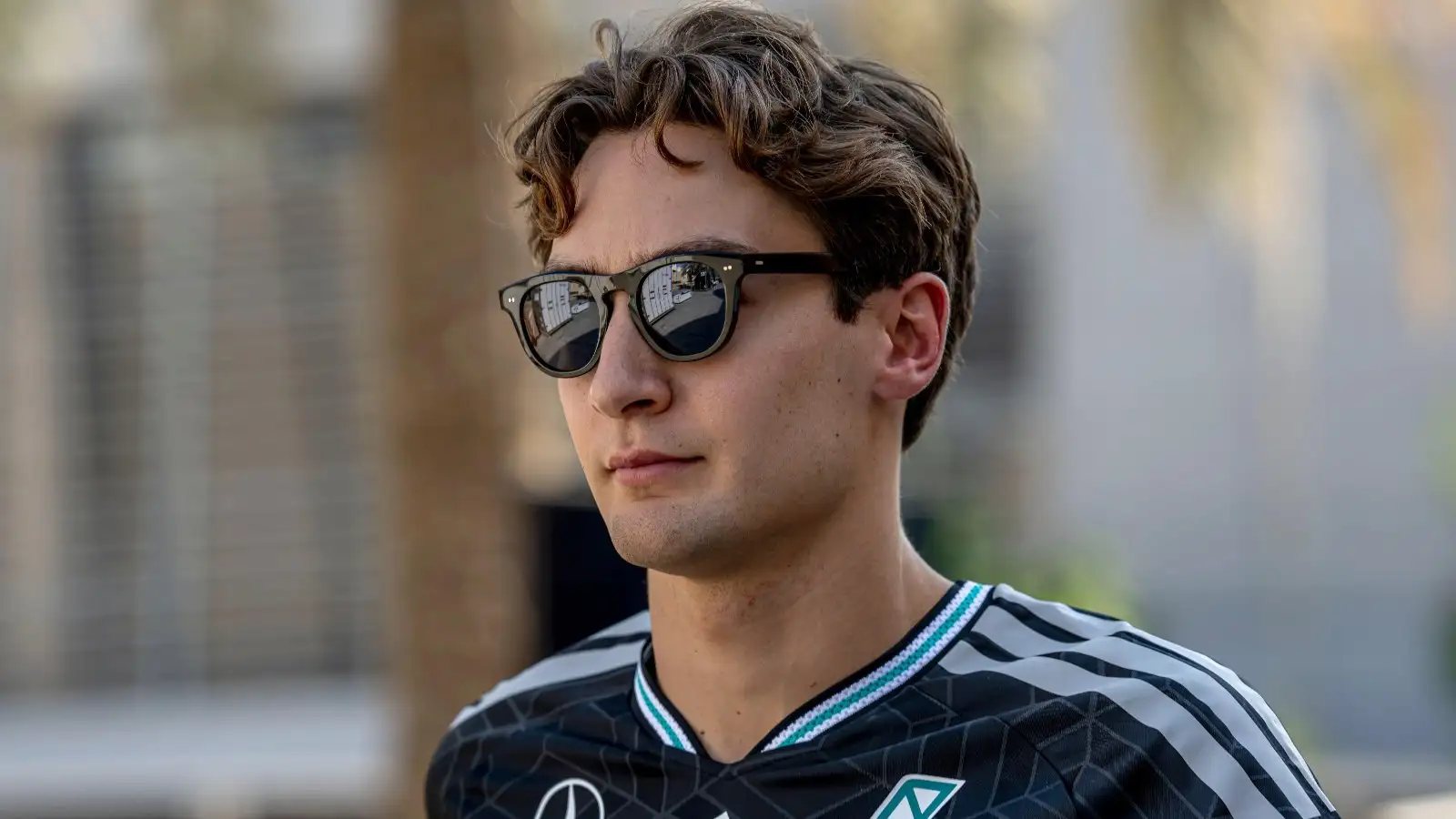 George Russell Using Iphone George Russell defends 2026 rules amid Max Verstappen criticism