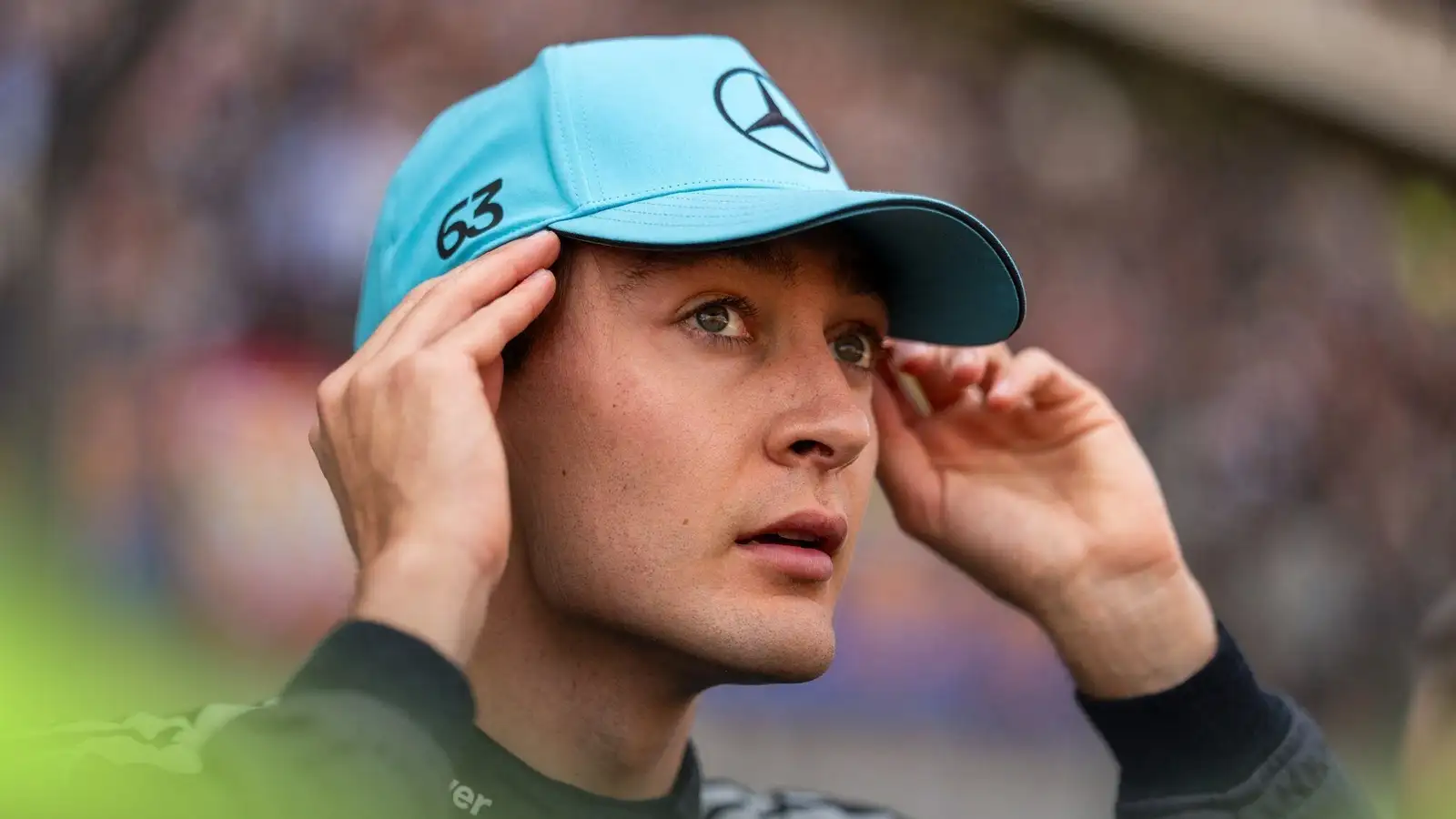 Russell survives ‘chaos’ to steal front-row start in China