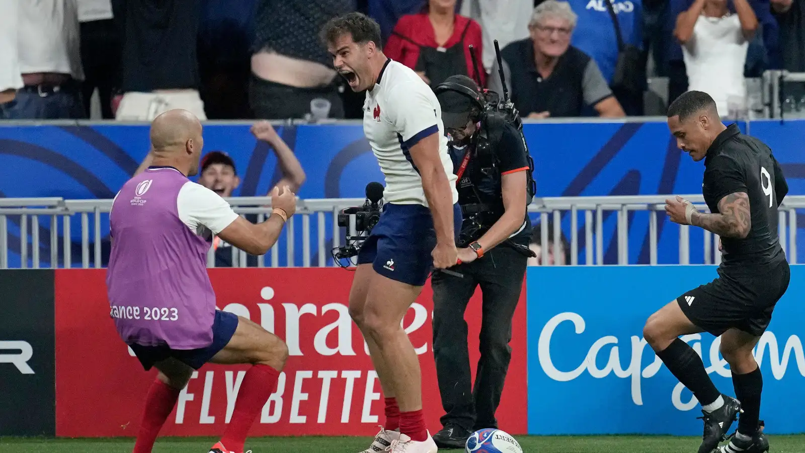 France wing Damian Penaud celebrates try against New Zealand.