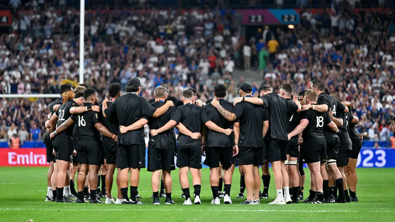 The All Blacks huddle after playing against France at the Rugby World Cup.