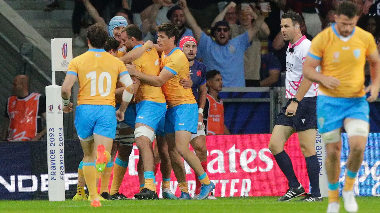 Uruguay celebrate try against France in Rugby World Cup game.