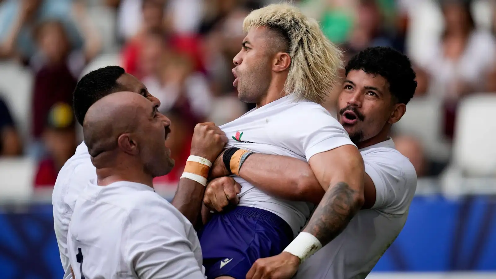 Un joueur des Samoa célèbre son essai contre le Chili.