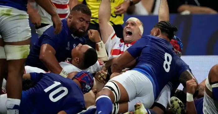 Japan after scoring a try against Samoa.