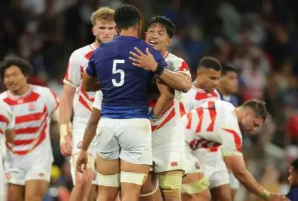 Japan celebrate after winning the Rugby World Cup Pool D match against Samoa.