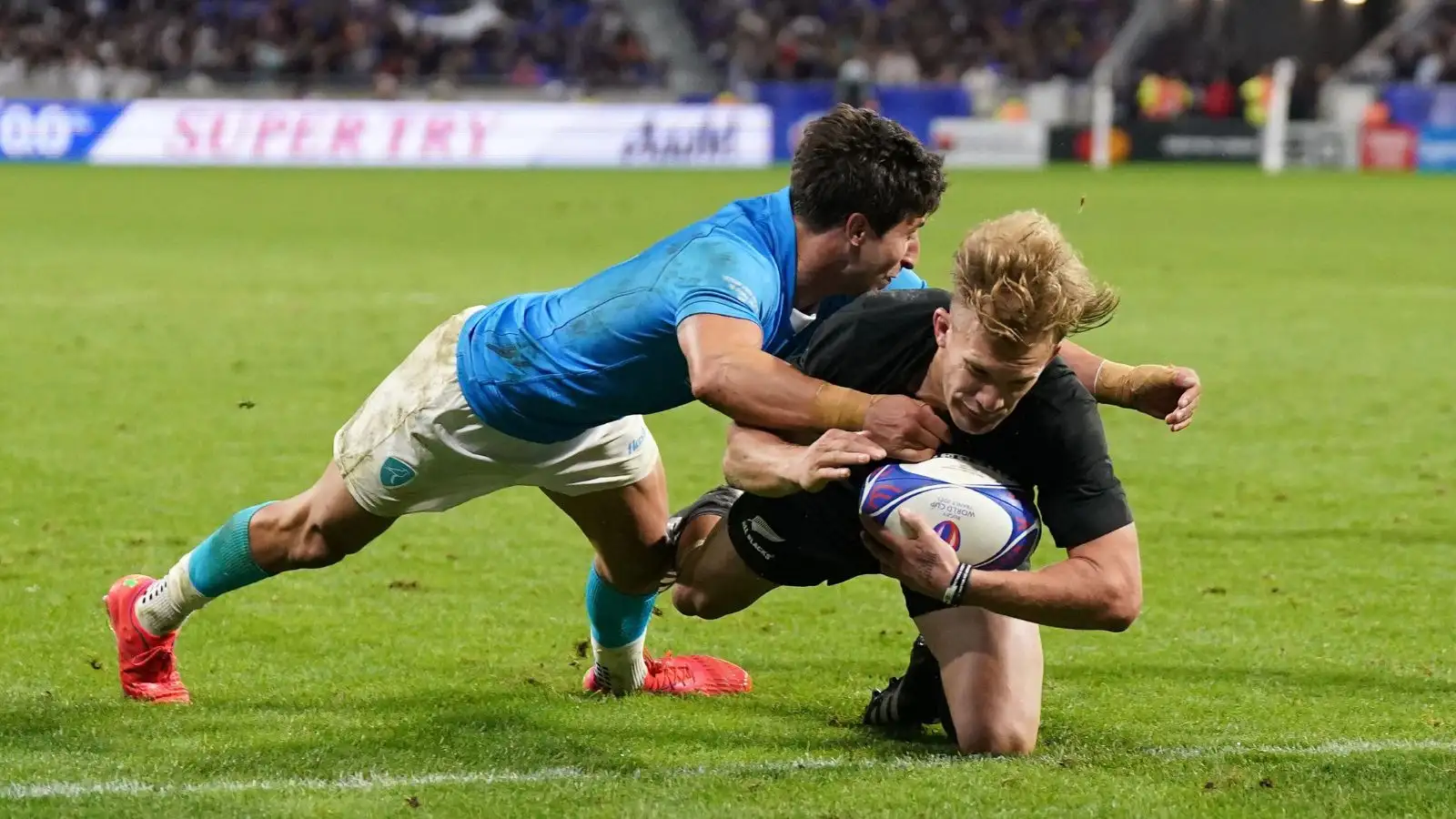 All Blacks fullback Damian Mckenzie scores a try during the Rugby World Cup 2023, Pool A match between New Zealand and Uruguay
