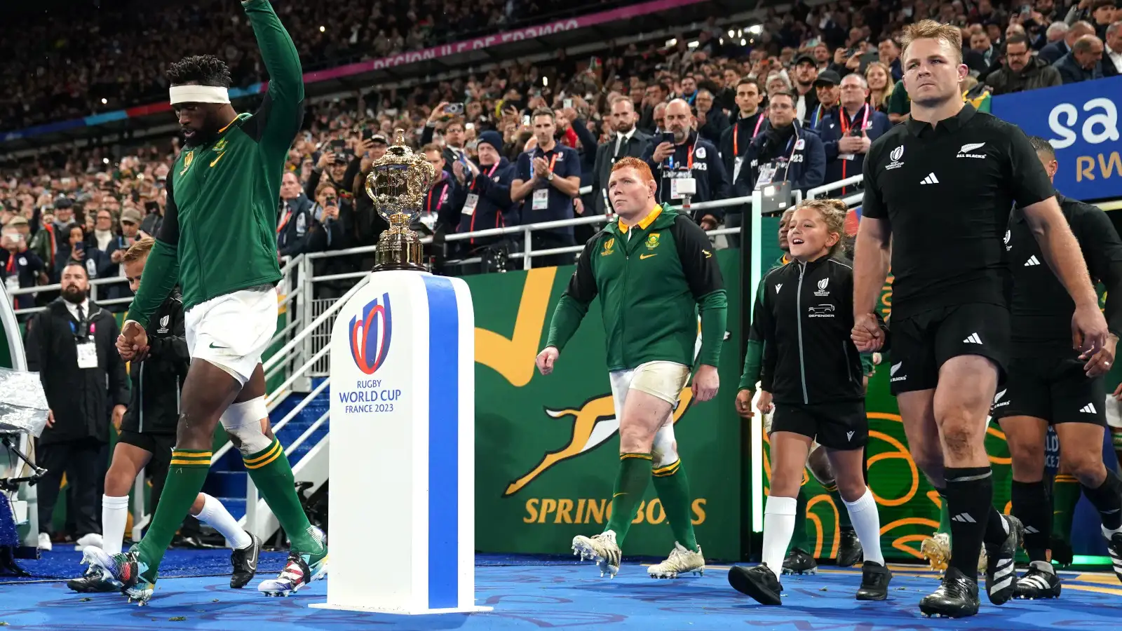 Siya Kolisi and Sam Cane lead out Springboks and All Blacks.