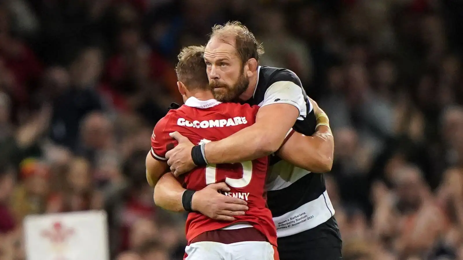 Wales' Leigh Halfpenny hugs Barbarians' Alun Wyn Jones as he is substituted off in his final appearance for the country during the Autumn International match at the Principality Stadium