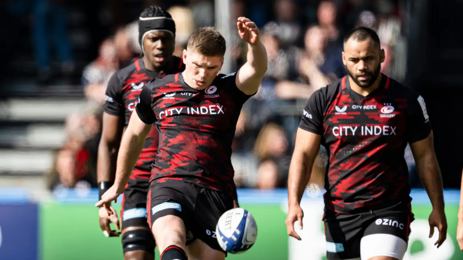 Saracens fly-half Owen Farrell kicking for touch.