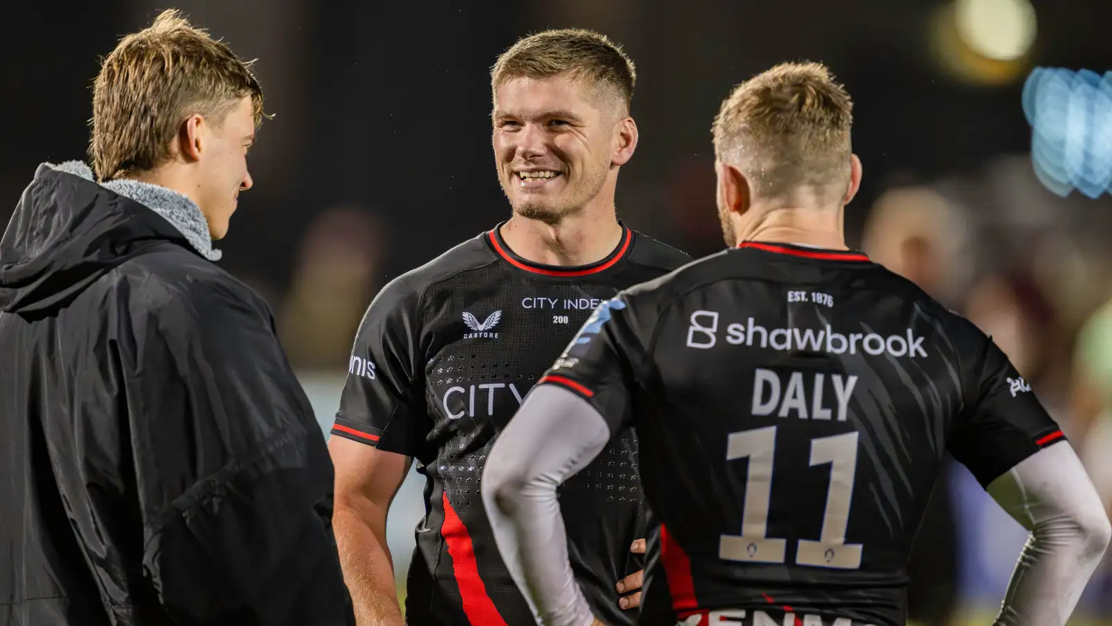 Owen Farrell and Elliot Daly after Saracens' Premiership victory over Leicester Tigers in 2023.