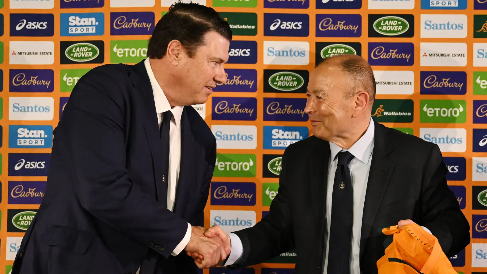 Rugby Australia chairman Hamish McLennan shaking hands with Eddie Jones in 2023.