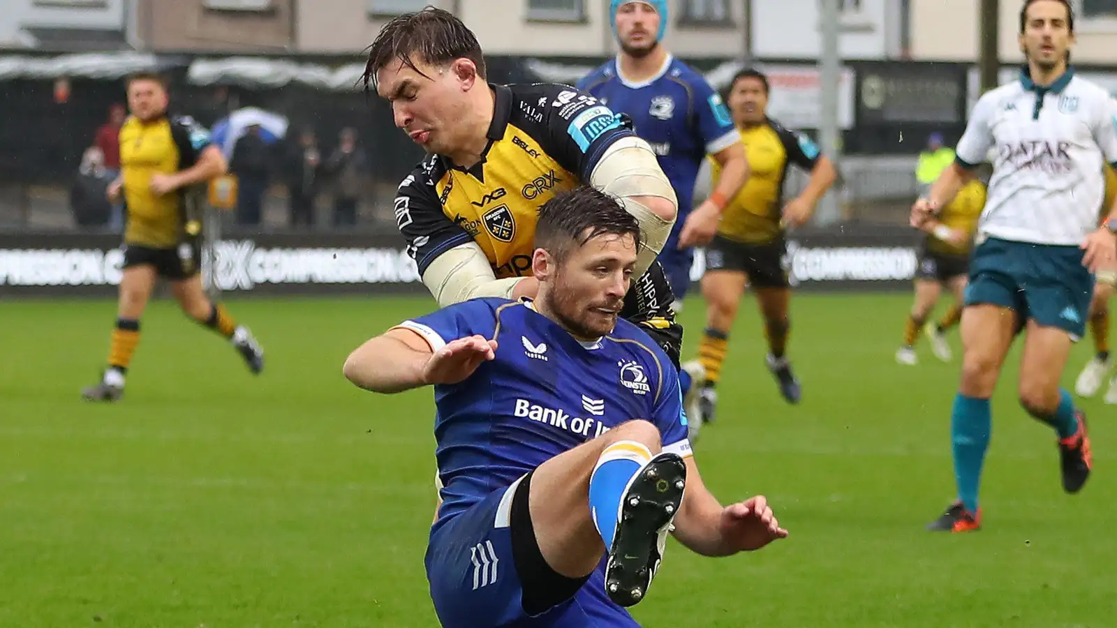 Taine Basham elbowing Ross Byrne in the Dragons v Leinster URC clash in 2023.