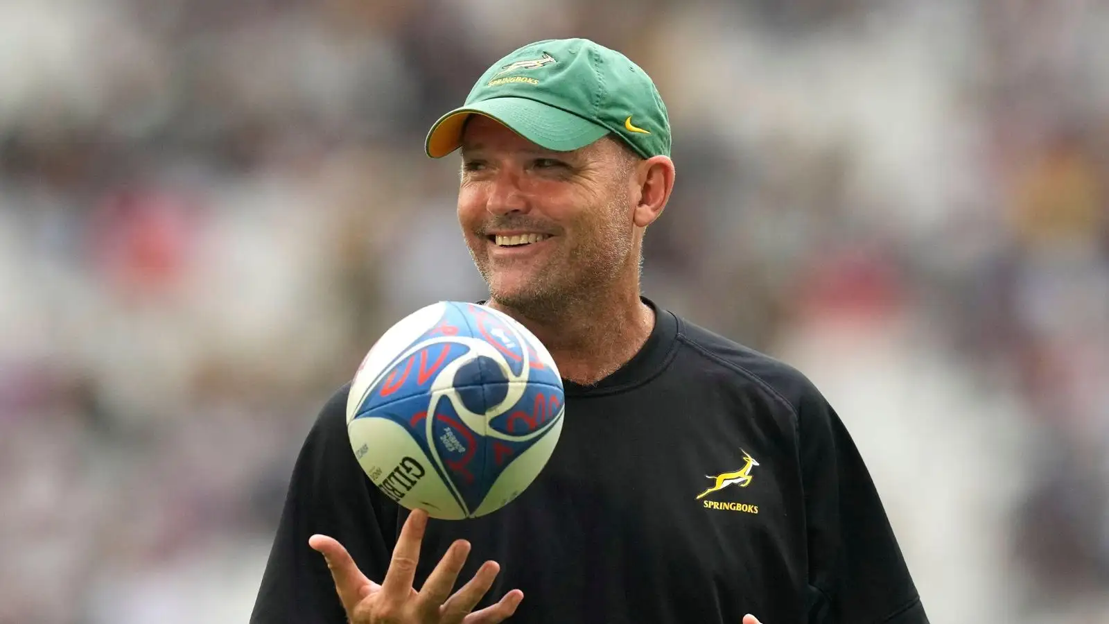 South Africa's head coach Jacques Nienaber plays with a ball before the start of the Rugby World Cup.