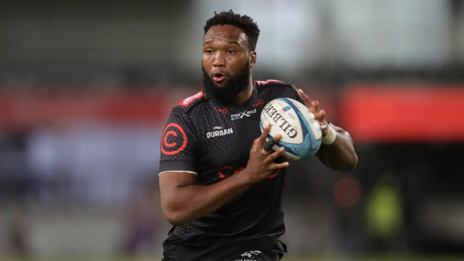 Lukhanyo Am on the charge for the Sharks.