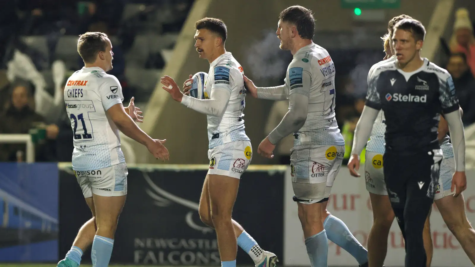 Exeter Chiefs celebrate Henry Slade try against Newcastle Falcons.