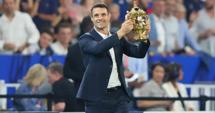 All Blacks legend Dan Carter holding the Webb Ellis Cup at the 2023 Rugby World Cup.