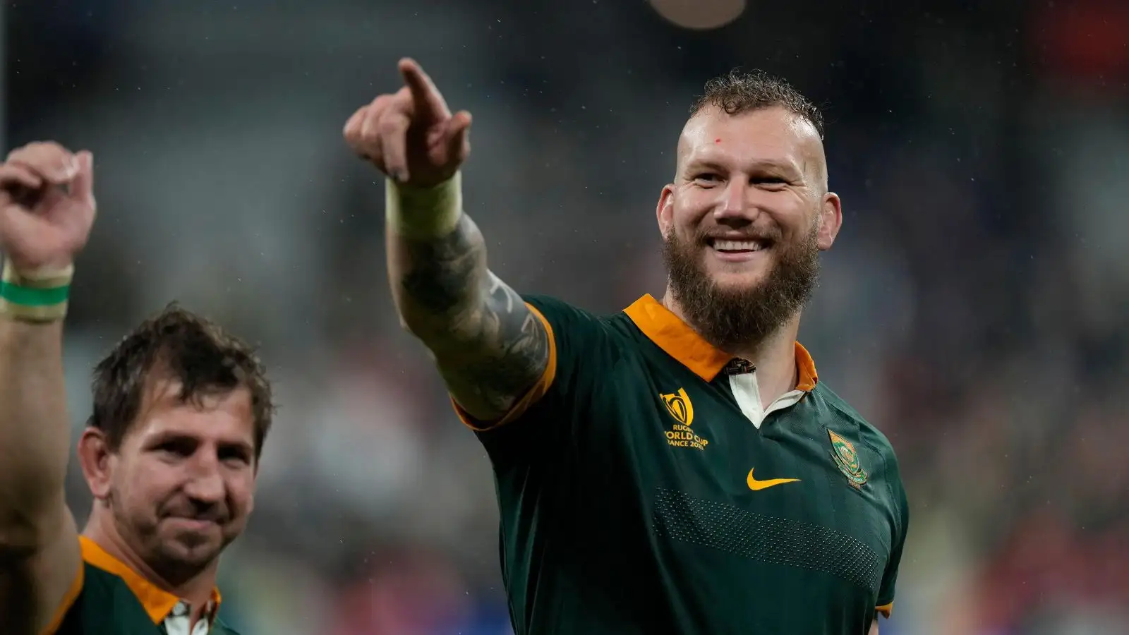 Springboks' forwards Kwagga Smith and RG Snyman celebrate after the Rugby World Cup semifinal match between England and South Africa at the Stade de France in Saint Denis.