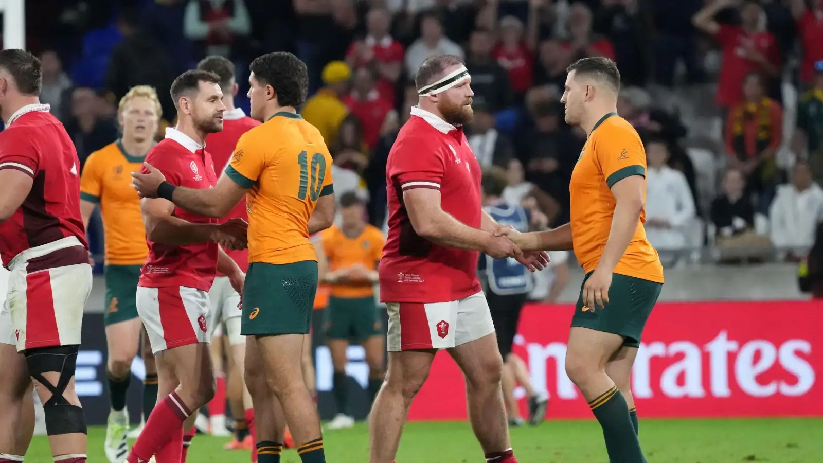 Wales and Australia players shake hands after the 2023 Rugby World Cup Pool C match between Wales and Australia at the Parc Olympique Lyonnais in Lyon, France on September 24, 2023.