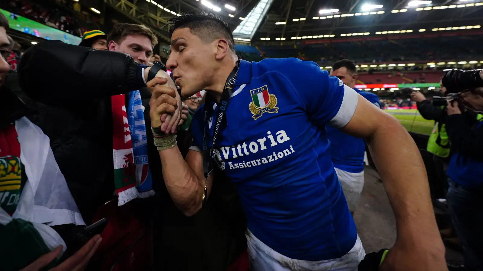 Italy centre Juan Ignacio Brex with fans.