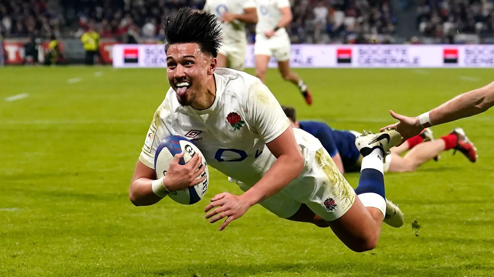 Marcus Smith diving over for England in Six Nations clash with France.