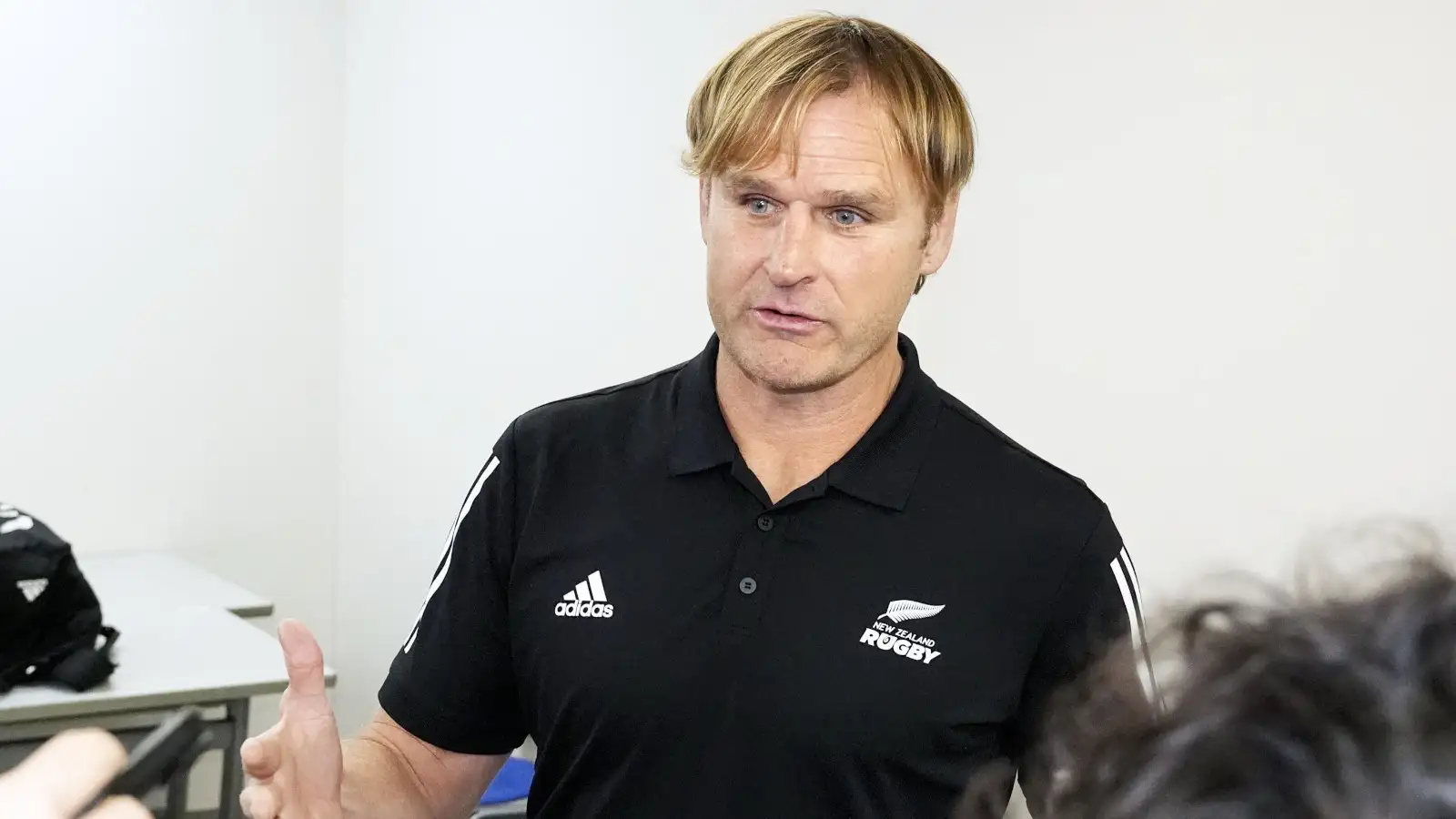 All Blacks head coach Scott Robertson speaking to reporters in Japan in 2024.