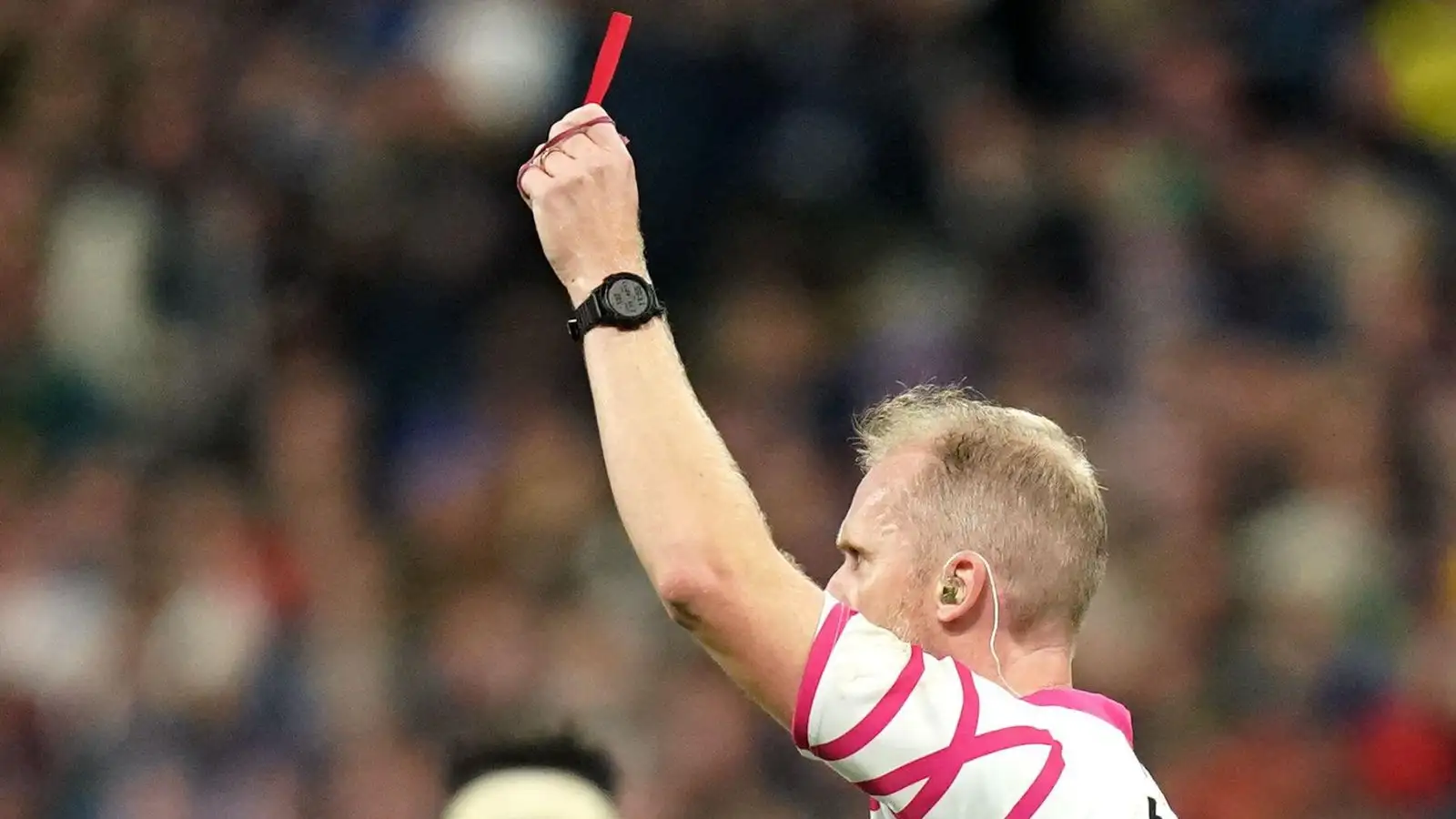 Referee Wayne Barnes shows a red card to New Zealand's Sam Cane (not pictured) the Rugby World Cup 2023 final match at the Stade de France in Paris, France.