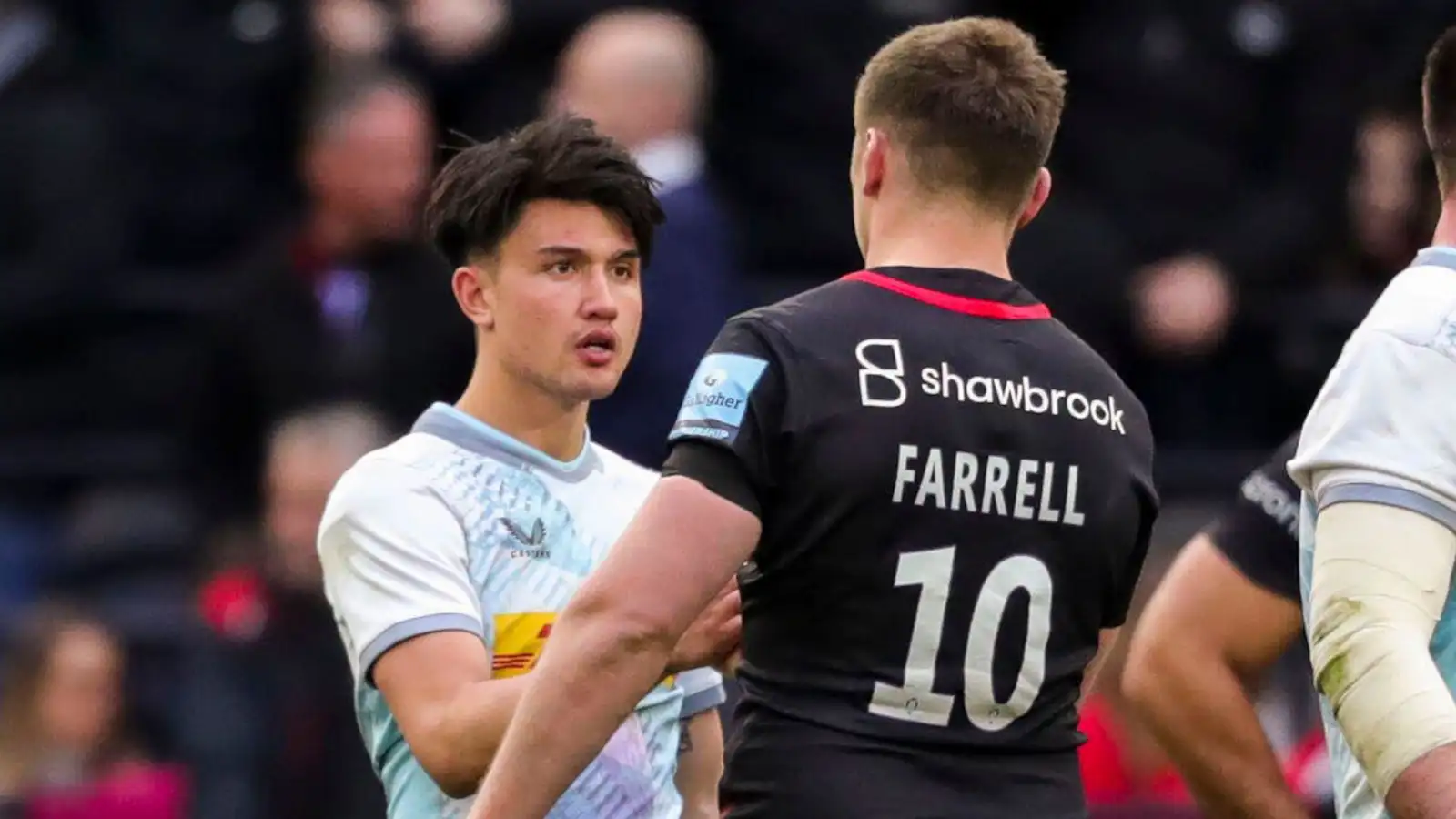 Owen Farrell and Marcus Smith shake hands after Saracens v Harlequins game in 2023.