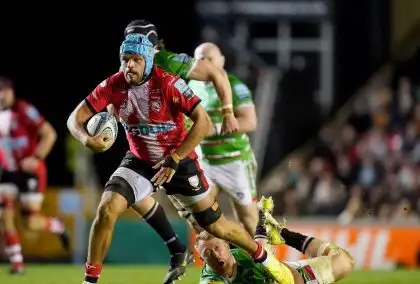 Gloucester's Zach Mercer skips away from a tackle from Leicester Tigers' Tommy Reffell during the Gallagher Premiership match at Mattioli Woods Welford Road Stadium