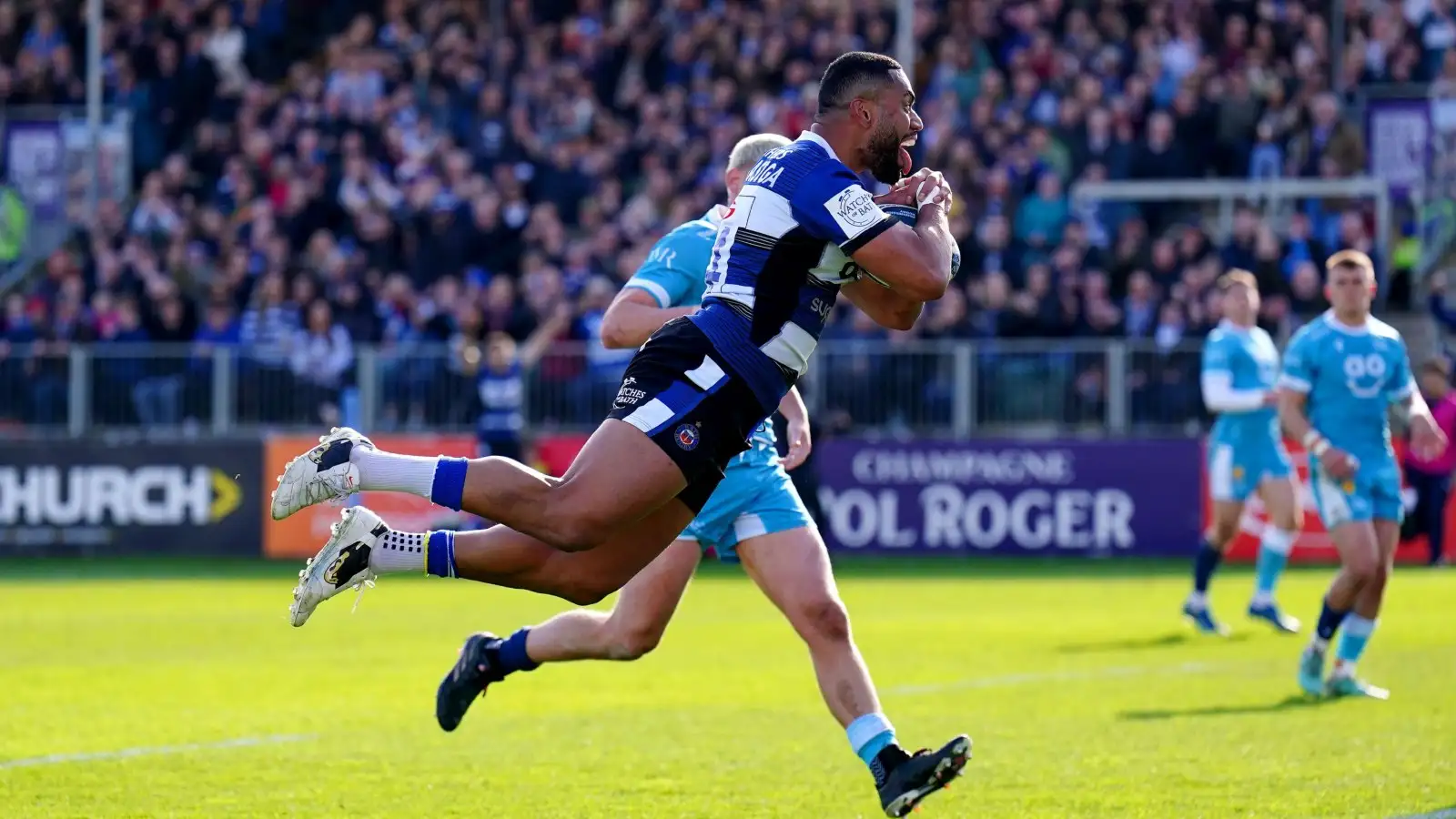Joe Cokanasiga scores a diving try for Bath.