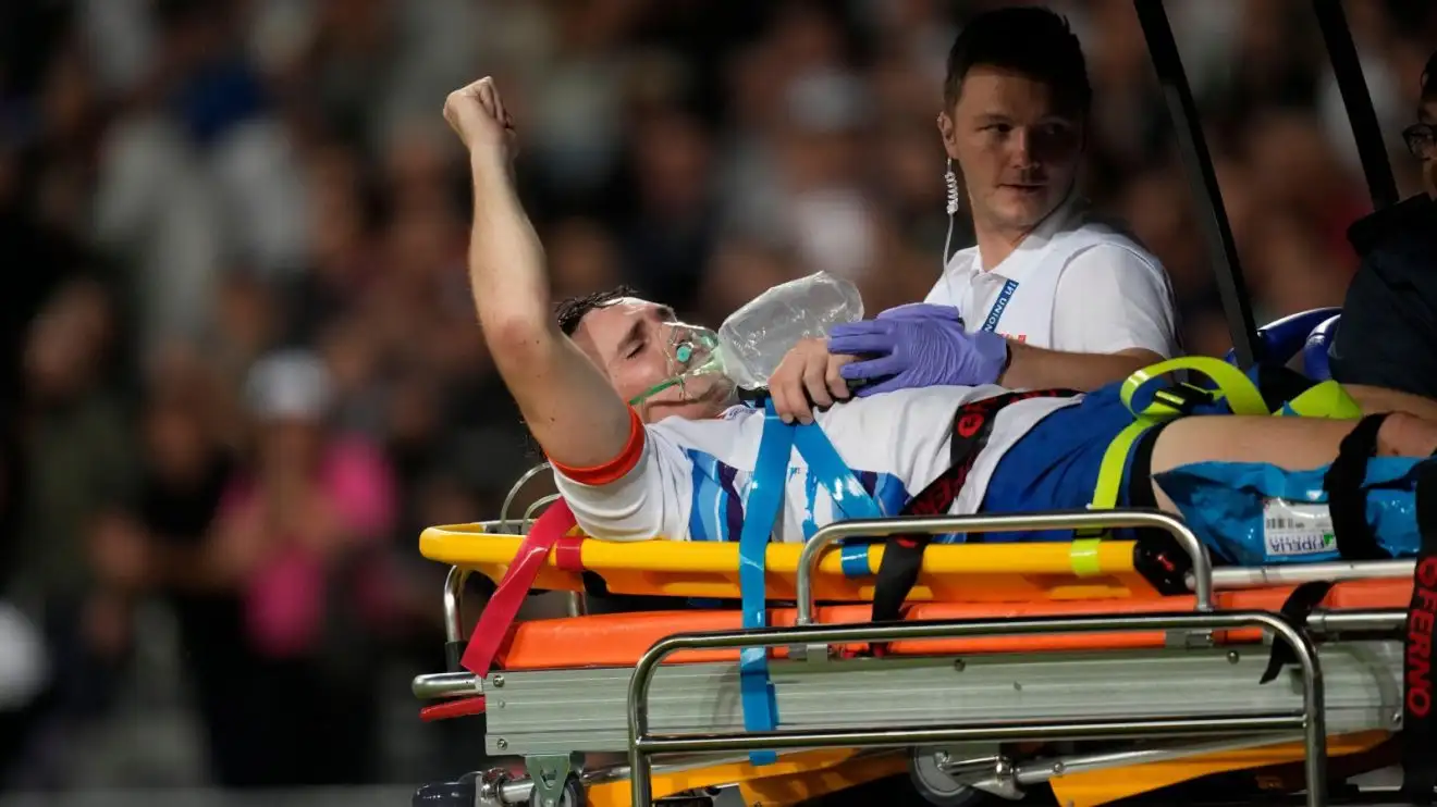 Namibia star Le Roux Malan being stretchered off against New Zealand at the Rugby World Cup.