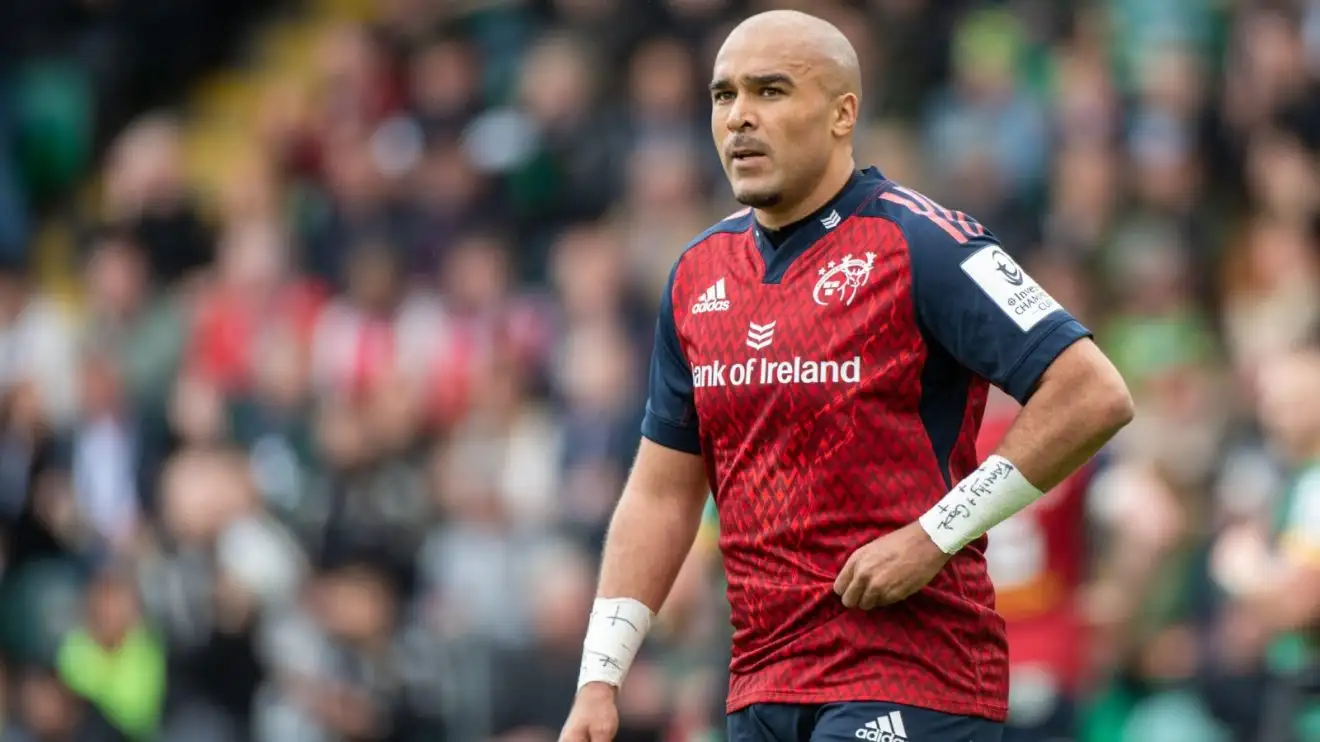 Munster wing Simon Zebo looking on.