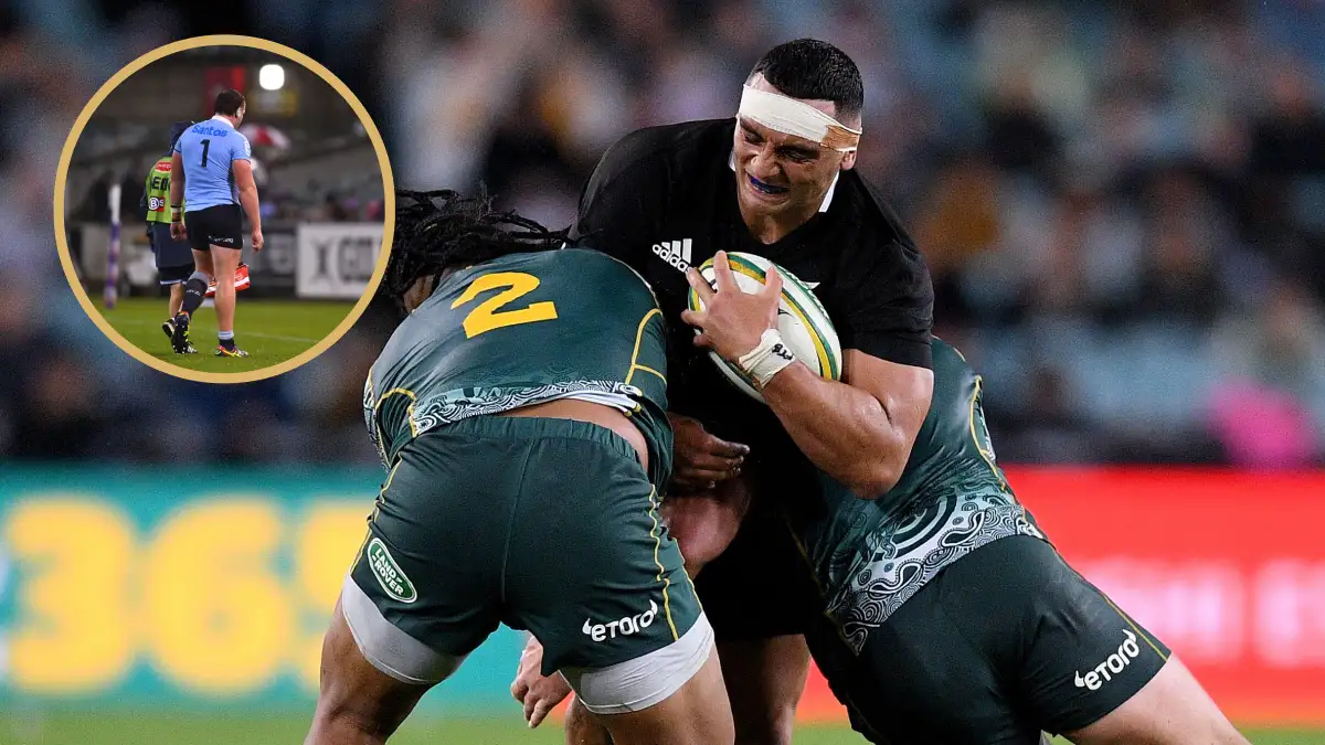 Alex Hodgman of the All Blacks playing against the Wallabies and injured Waratahs prop Angus Bell.