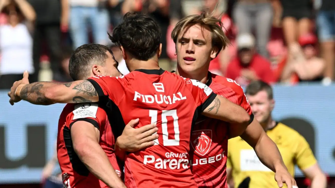 Toulouse players celebrate a try.