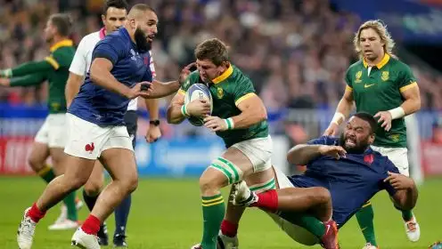 South Africa's Kwagga Smith is tackled by France’s Uini Atonio and Reda Wardi during the Rugby World Cup 2023 quarter final match at the Stade de France, Saint-Denis.