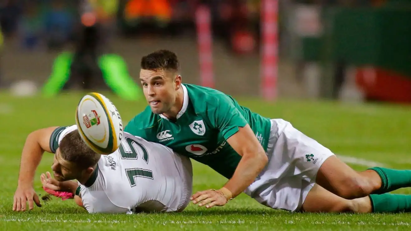Ireland Conor Murry, right, looks at the ball during their rugby test against South Africa at Newlands stadium in Cape Town, South Africa, Saturday, June 11, 2016.