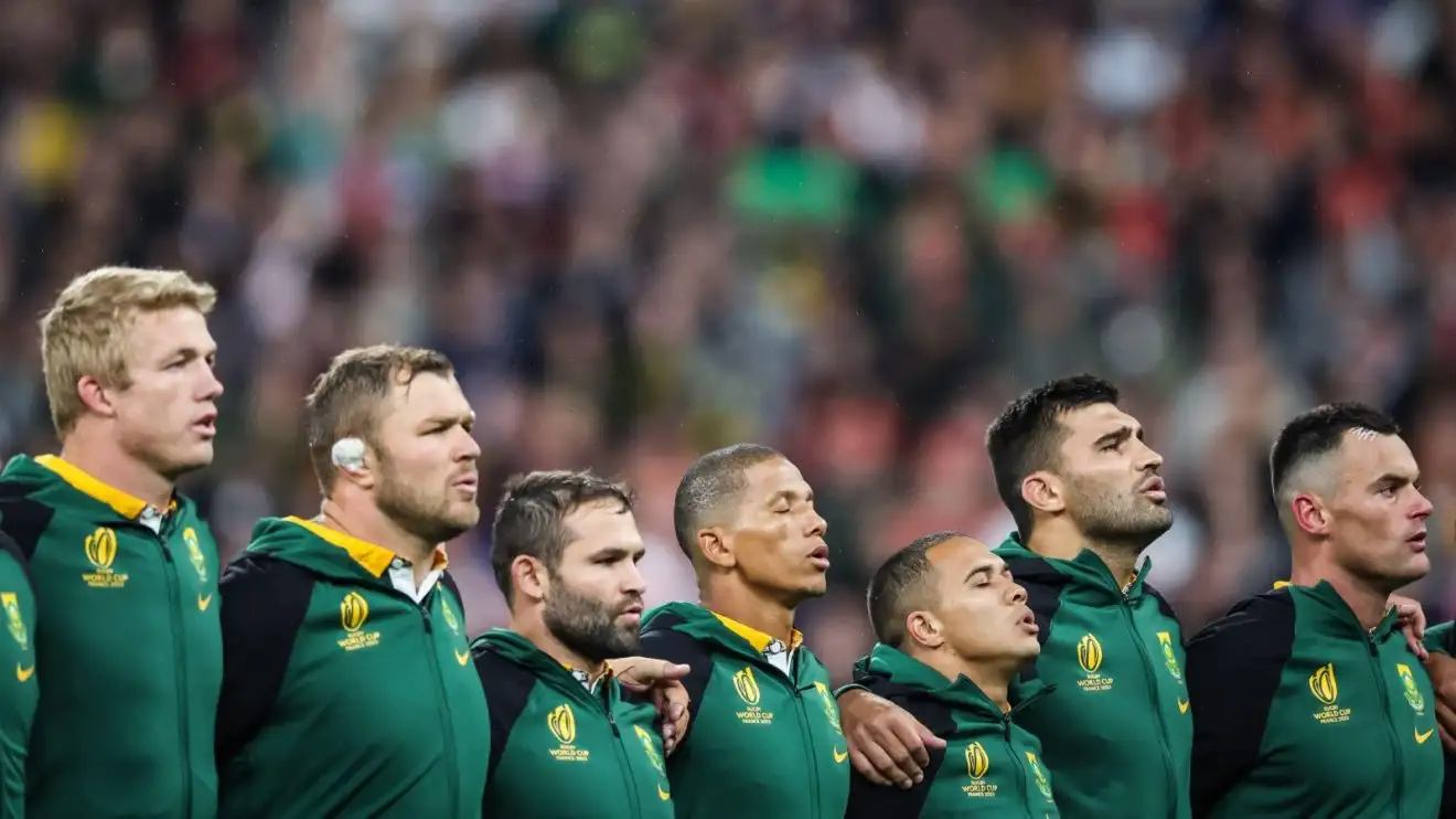 Springboks players sing the national anthem.