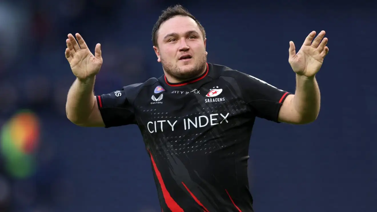 Saracens hooker Jamie George waving at fans.