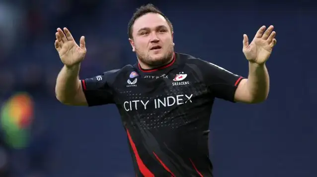 Saracens hooker Jamie George waving at fans.