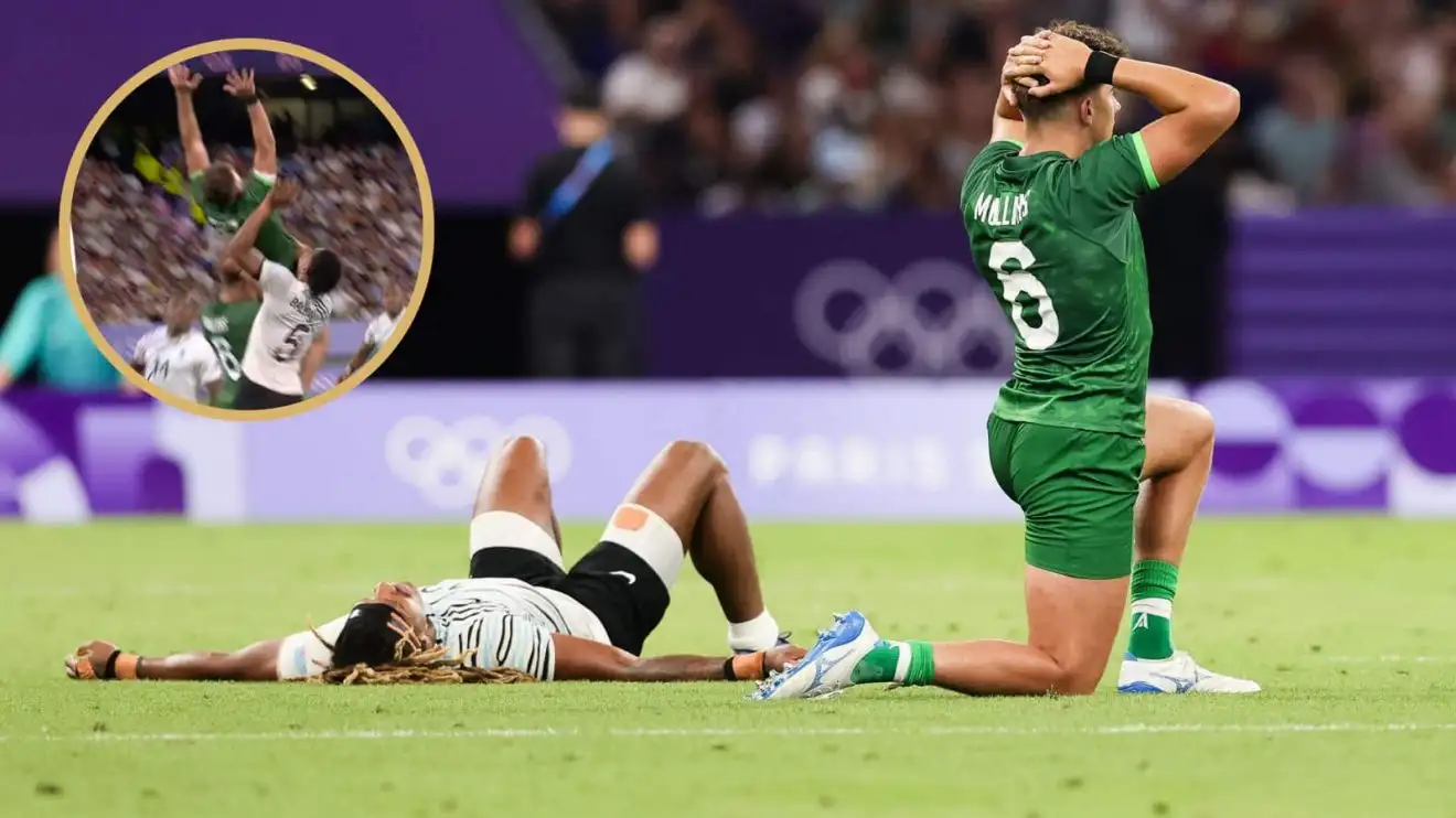Selesitino Ravutaumada of Fiji and Chay Mullins of Ireland react after during the Paris 2024 Olympic Games Rugby Sevens quarter-final.
